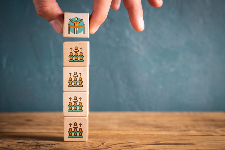 election process shown as symbols on cubes on wooden background