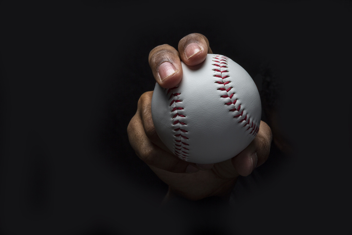 If you want to know how to throw a Curveball. Look at the photo that shows the grip